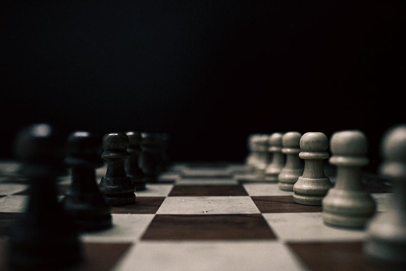 The Surprising Similarities between Playing Chess and Developing Software